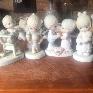 4 Precious Moments figurines